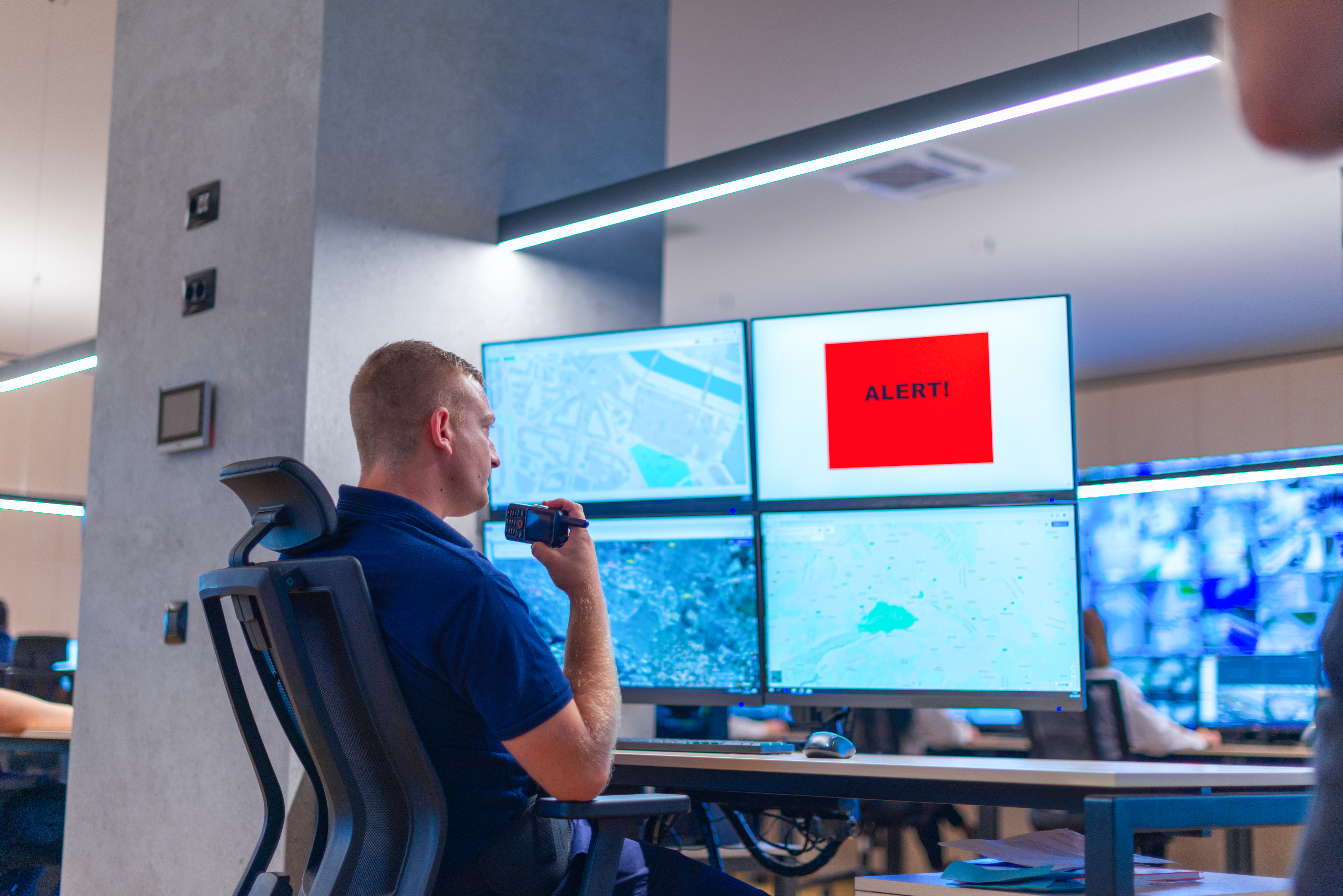 Modern data dashboard showing live security metrics and maps